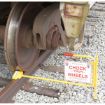 Rail Chock with "Chock Your Wheels" Sign.